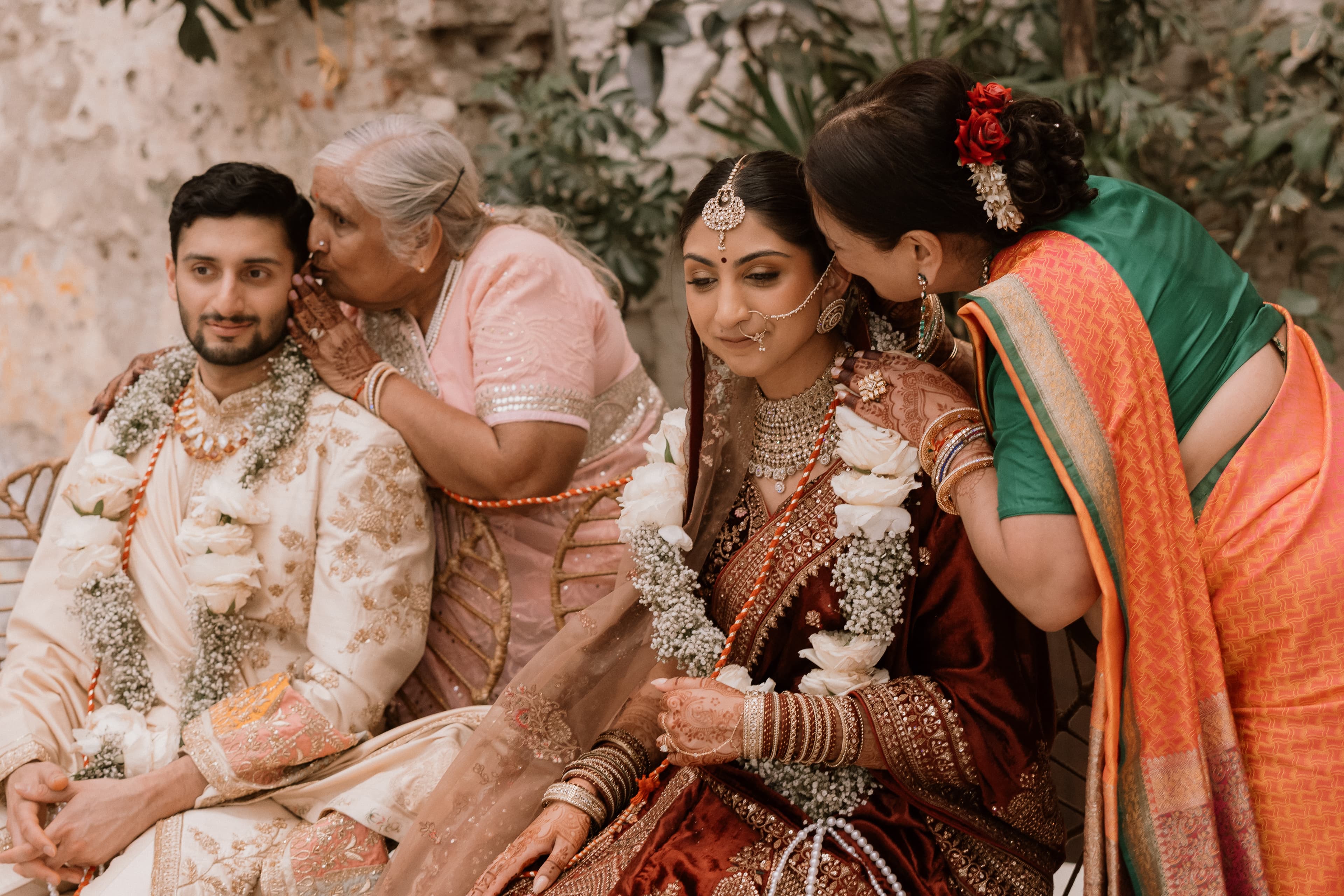 South Asian wedding family portrait — multi-generational celebration