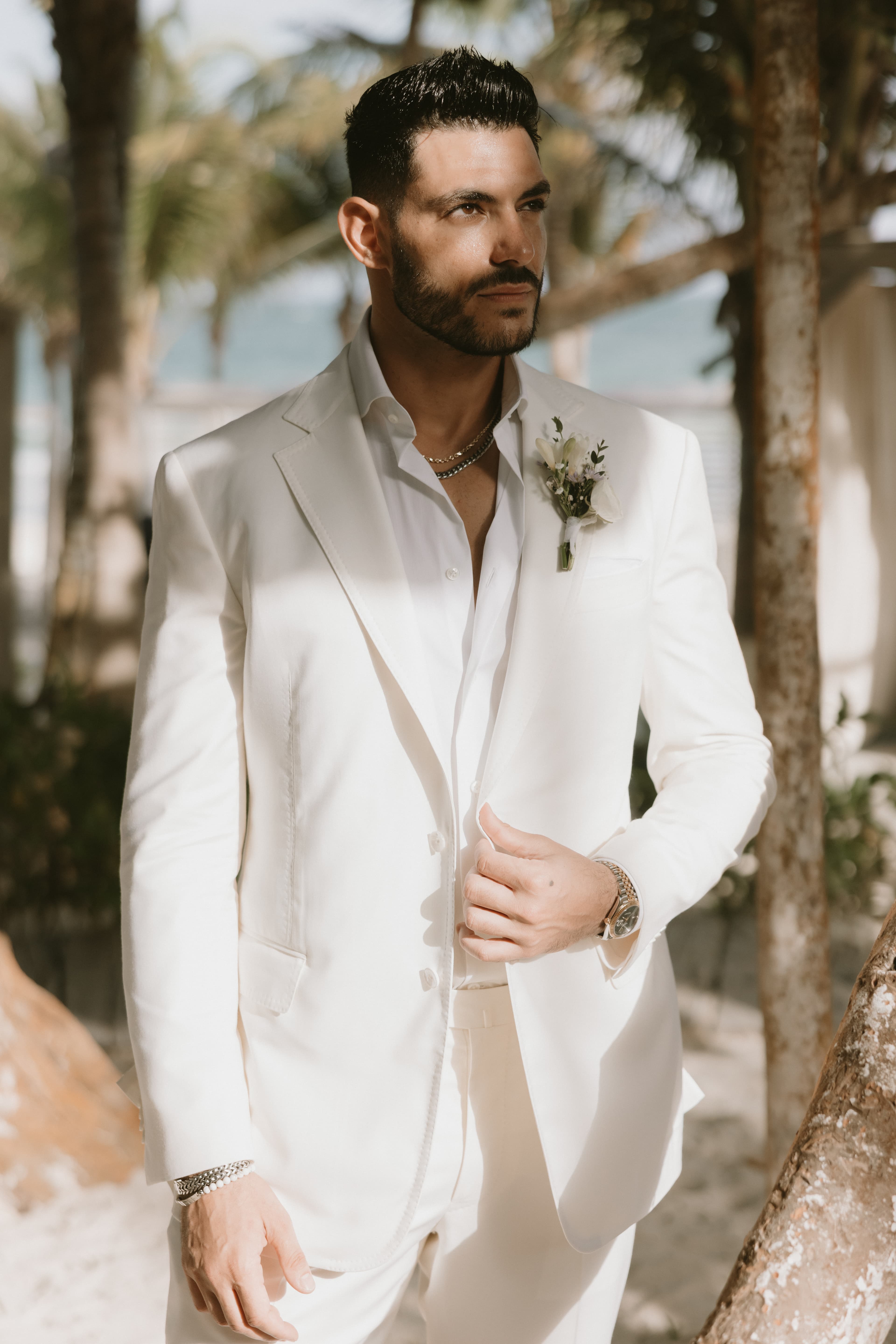 Couple embracing during golden hour at destination wedding